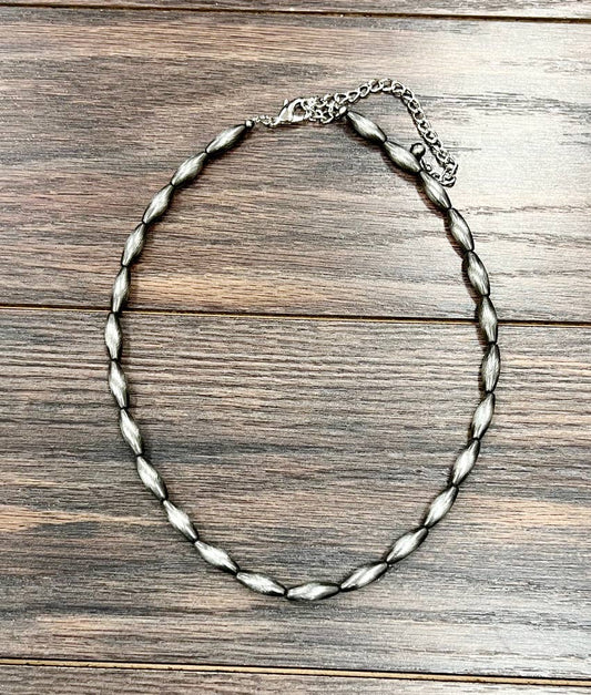 739531, 18" 18mm Elongated Navajo Bead Necklace