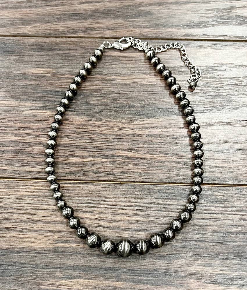 739283, Handmade 16" 14mm Graduated Polish Navajo Necklace