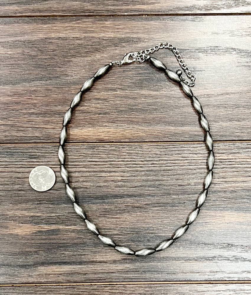 739531, 18" 18mm Elongated Navajo Bead Necklace
